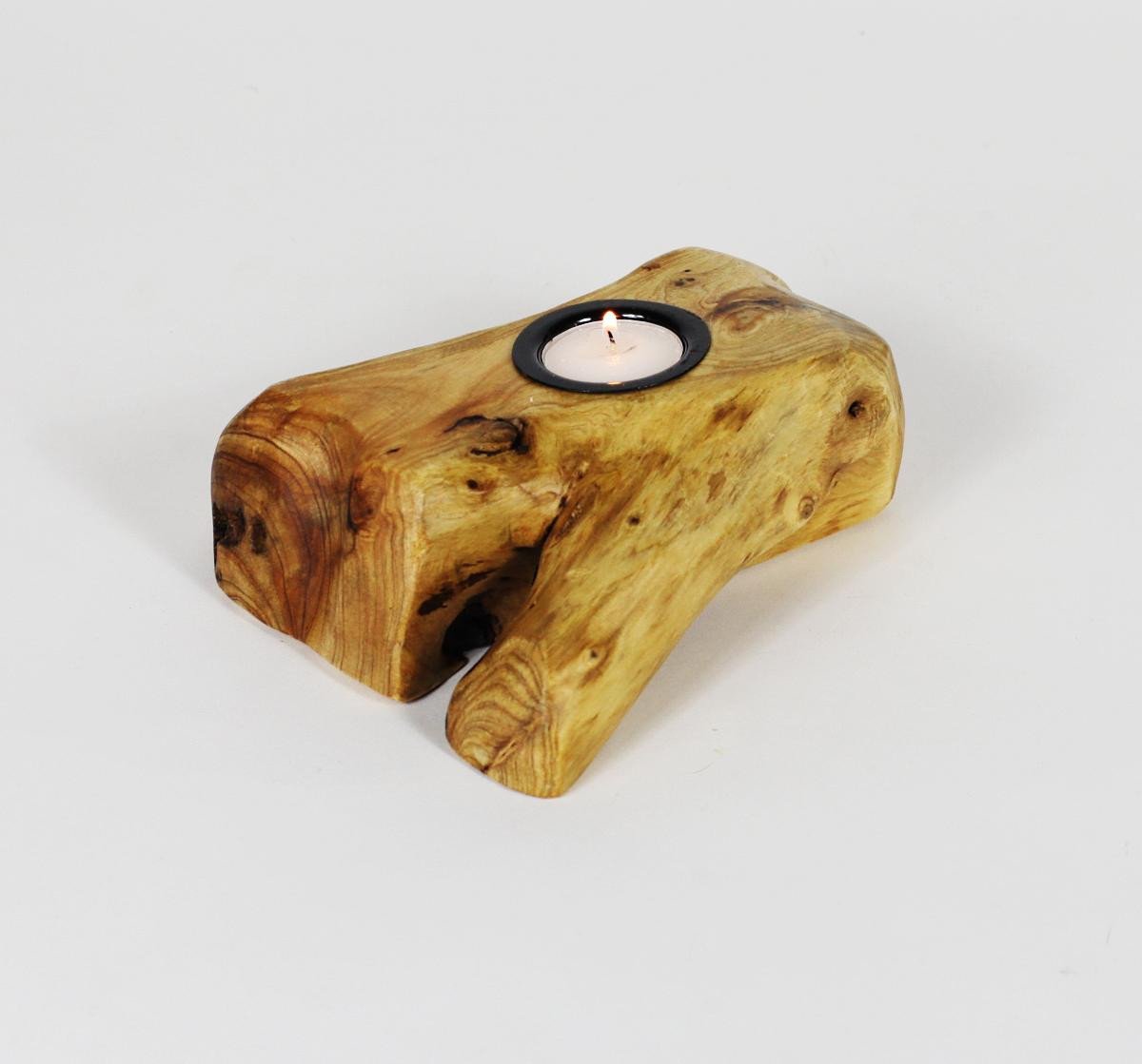 FUNCTIONAL ART is the best way to describe Greener Valley's stunning collection of stumps and roots that have been handcrafted into beautiful wine holders, cheese boards, platters, bowls and stools. Handcrafted from the roots and stumps of the Asian Cypress known as Shan Mu. These beautiful stools function equally well as a stool, end table or plant stand. Each piece is absolutely unique. This stool measures 24" high.