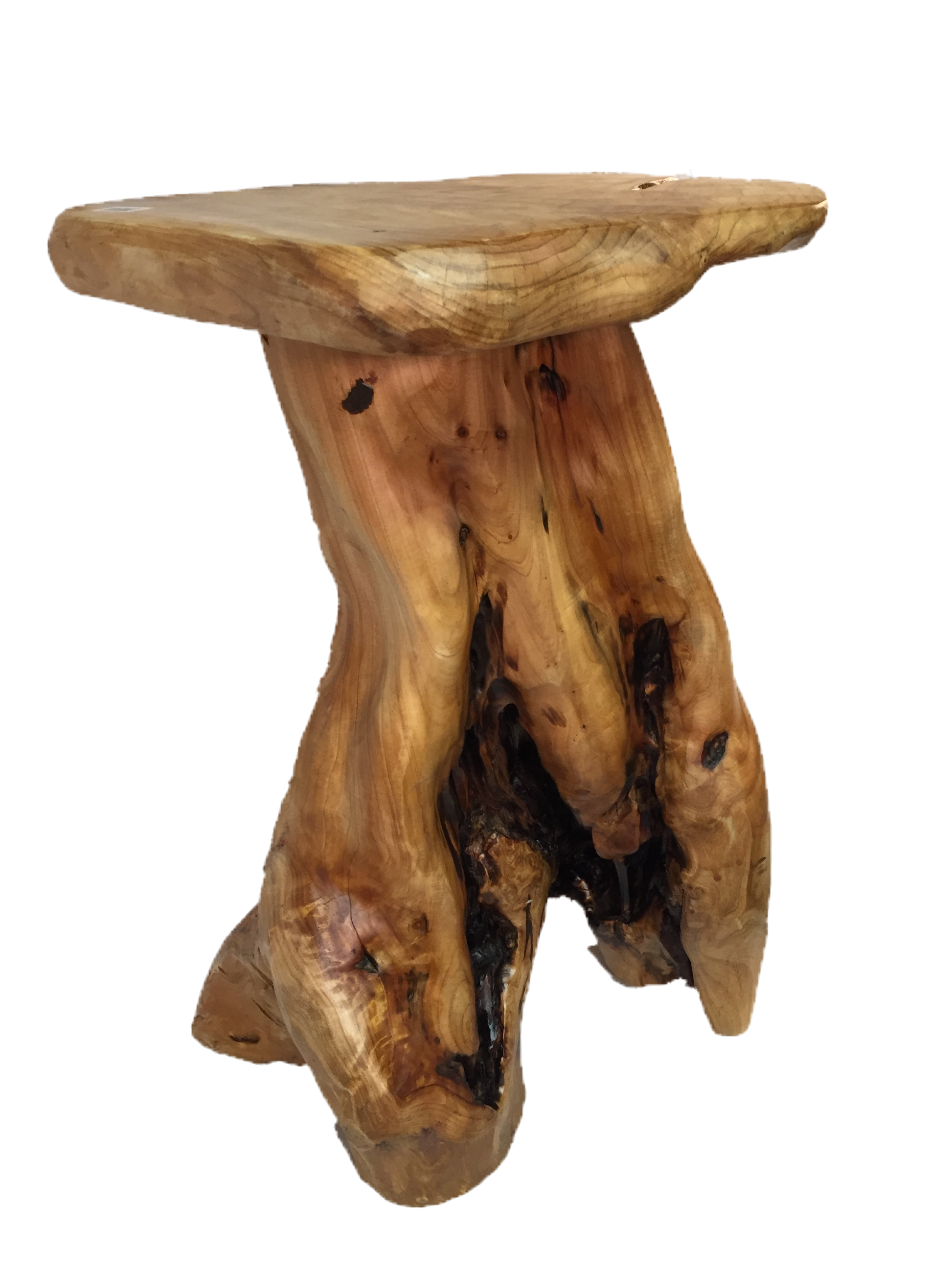 FUNCTIONAL ART is the best way to describe Greener Valley's stunning collection of stumps and roots that have been handcrafted into beautiful wine holders, cheese boards, platters, bowls and stools. Handcrafted from the roots and stumps of the Asian Cypress known as Shan Mu. These beautiful stools function equally well as a stool, end table or plant stand. Each piece is absolutely unique. This stool measures 24" high.