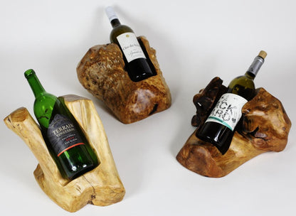 FUNCTIONAL ART is the best way to describe Greener Valley's stunning collection of stumps and roots that have been handcrafted into beautiful wine holders, cheese boards, platters, bowls and stools. Handcrafted from the roots and stumps of the Asian Cypress known as Shan Mu. These beautiful stools function equally well as a stool, end table or plant stand. Each piece is absolutely unique. This stool measures 24" high.