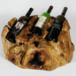 FUNCTIONAL ART is the best way to describe Greener Valley's stunning collection of stumps and roots that have been handcrafted into beautiful wine holders, cheese boards, platters, bowls and stools. Handcrafted from the roots and stumps of the Asian Cypress known as Shan Mu. These beautiful stools function equally well as a stool, end table or plant stand. Each piece is absolutely unique. This stool measures 24" high.