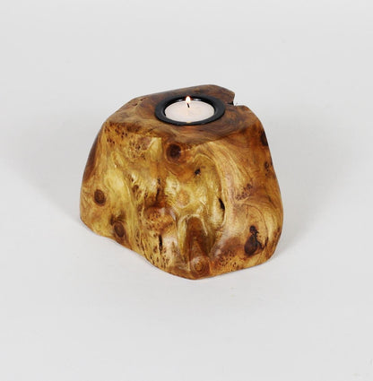 FUNCTIONAL ART is the best way to describe Greener Valley's stunning collection of stumps and roots that have been handcrafted into beautiful wine holders, cheese boards, platters, bowls and stools. Handcrafted from the roots and stumps of the Asian Cypress known as Shan Mu. These beautiful stools function equally well as a stool, end table or plant stand. Each piece is absolutely unique. This stool measures 24" high.