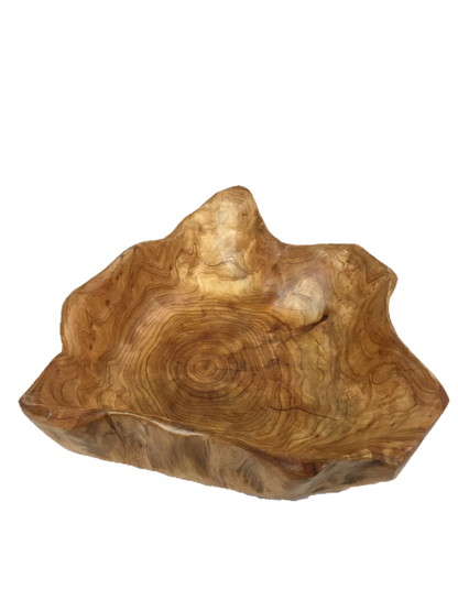 FUNCTIONAL ART is the best way to describe Greener Valley's stunning collection of stumps and roots that have been handcrafted into beautiful wine holders, cheese boards, platters, bowls and stools. Handcrafted from the roots and stumps of the Asian Cypress known as Shan Mu. These beautiful stools function equally well as a stool, end table or plant stand. Each piece is absolutely unique. This stool measures 24" high.
