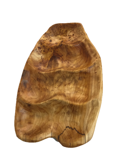 FUNCTIONAL ART is the best way to describe Greener Valley's stunning collection of stumps and roots that have been handcrafted into beautiful wine holders, cheese boards, platters, bowls and stools. Handcrafted from the roots and stumps of the Asian Cypress known as Shan Mu. These beautiful stools function equally well as a stool, end table or plant stand. Each piece is absolutely unique. This stool measures 24" high.