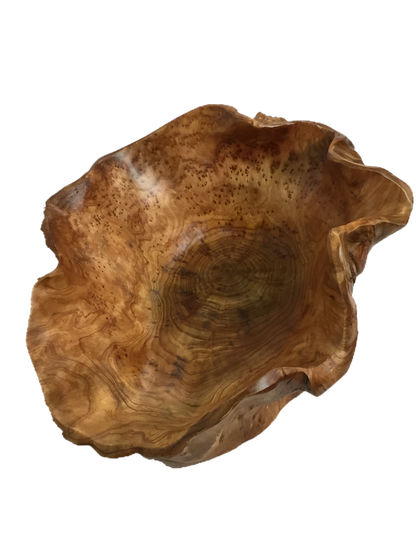 FUNCTIONAL ART is the best way to describe Greener Valley's stunning collection of stumps and roots that have been handcrafted into beautiful wine holders, cheese boards, platters, bowls and stools. Handcrafted from the roots and stumps of the Asian Cypress known as Shan Mu. These beautiful stools function equally well as a stool, end table or plant stand. Each piece is absolutely unique. This stool measures 24" high.
