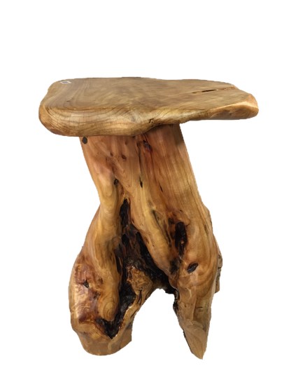 FUNCTIONAL ART is the best way to describe Greener Valley's stunning collection of stumps and roots that have been handcrafted into beautiful wine holders, cheese boards, platters, bowls and stools. Handcrafted from the roots and stumps of the Asian Cypress known as Shan Mu. These beautiful stools function equally well as a stool, end table or plant stand. Each piece is absolutely unique. This stool measures 24" high.