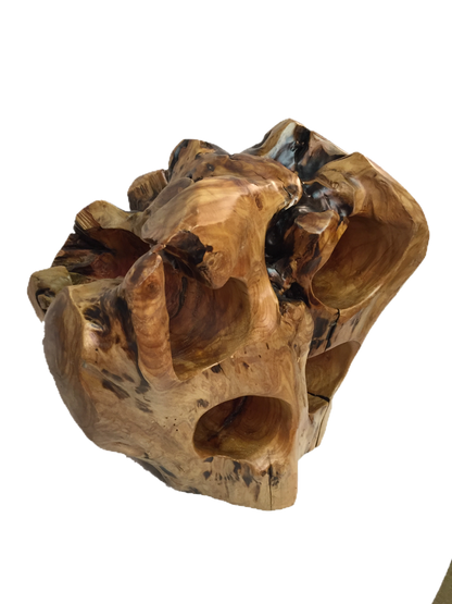 FUNCTIONAL ART is the best way to describe Greener Valley's stunning collection of stumps and roots that have been handcrafted into beautiful wine holders, cheese boards, platters, bowls and stools. Handcrafted from the roots and stumps of the Asian Cypress known as Shan Mu. These beautiful stools function equally well as a stool, end table or plant stand. Each piece is absolutely unique. This stool measures 24" high.